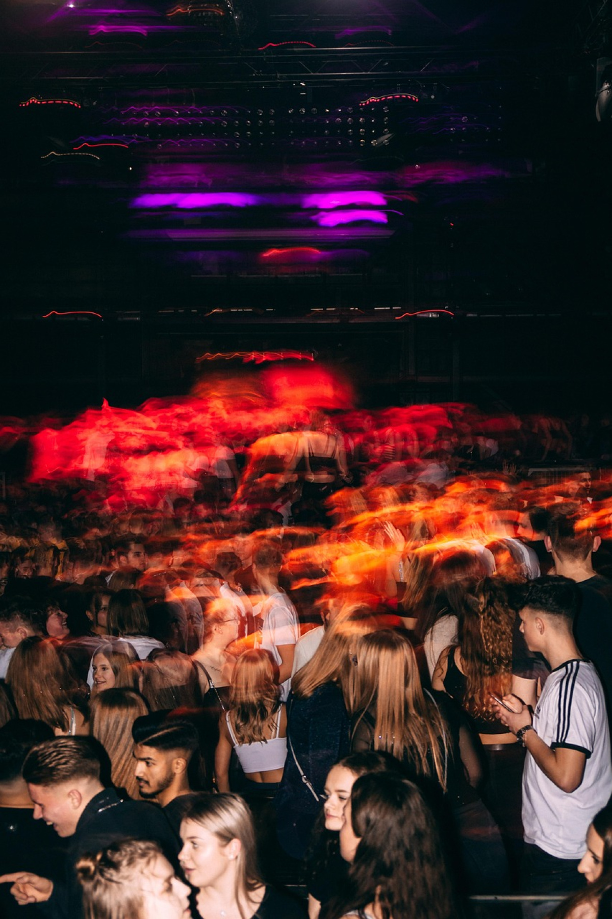 A crowd in a club dancing