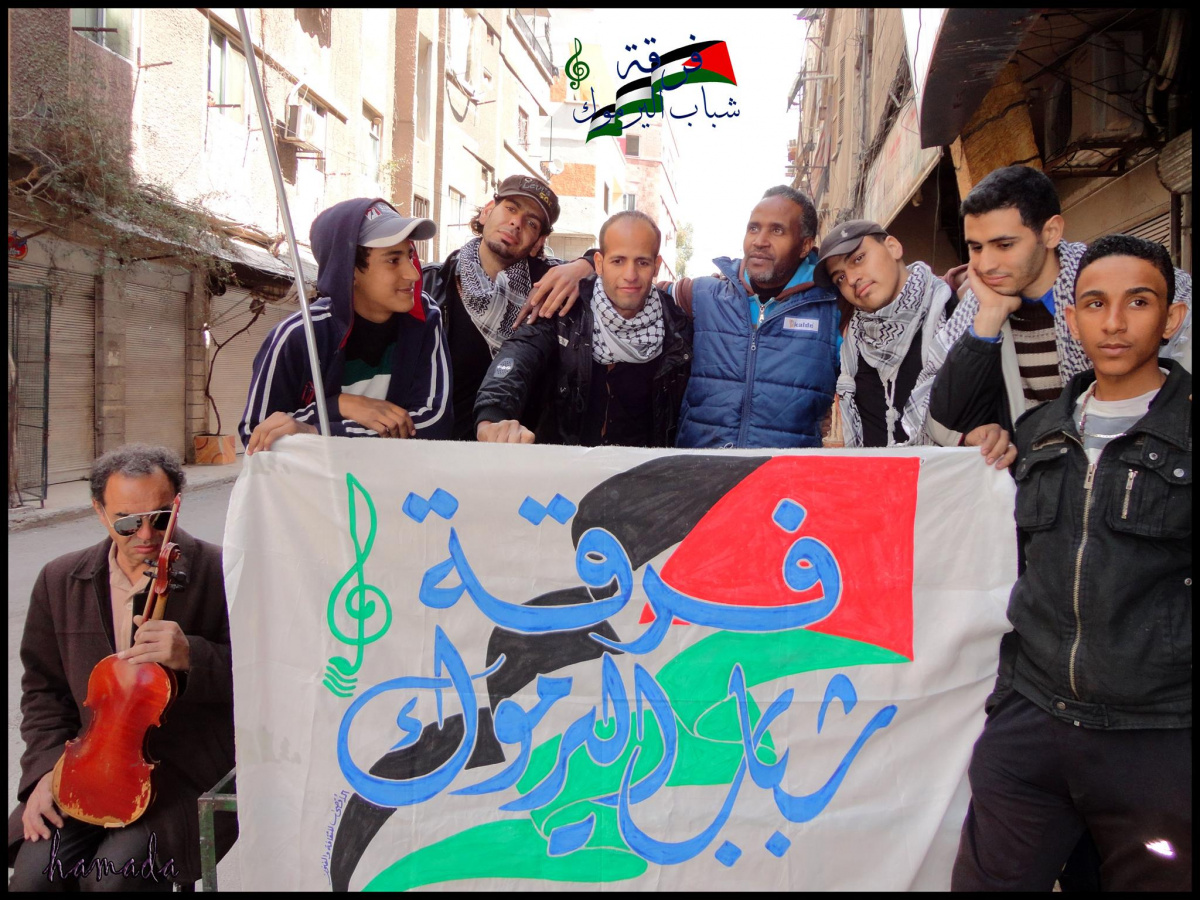 Musicians in the district Yarmouk in Damascus, Syria, including Aeham ahmad’s father (bottom left; photo: Facebook).