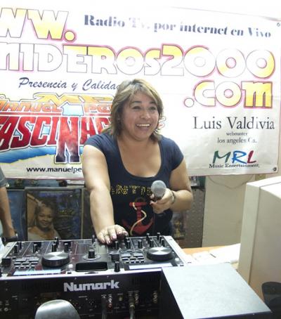 Sonido Coronado/Señor Cruz with DJ equipment and record collection in the house of his family, Peñón de los Baños neighborhood, Mexico City, 2010 (photo: Mirjam Wirz)