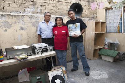 Sonido Continental 2000/Miguel Angel Cruz Flores with his family in the courtyard of their house, Peñón de los Baños neighborhood, Mexico City, 2010 (photo: Mirjam Wirz)