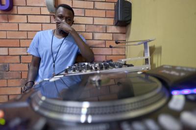 DJ Shiru in his shop in Kampala (photo: Thomas Burkhalter)