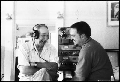 Wade Ward listening to playback with Alan Lomax at the Ward home, Galax, Virginia, 1959 (photo: Alan Lomax).