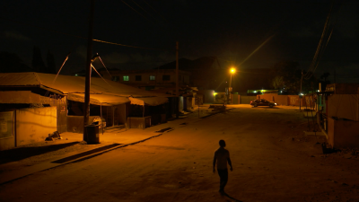 Street at night in Accra, Ghana (Filmstill: Contradict, Thomas Burkhalter & Peter Guyer, Switzerland/Ghana 2020)